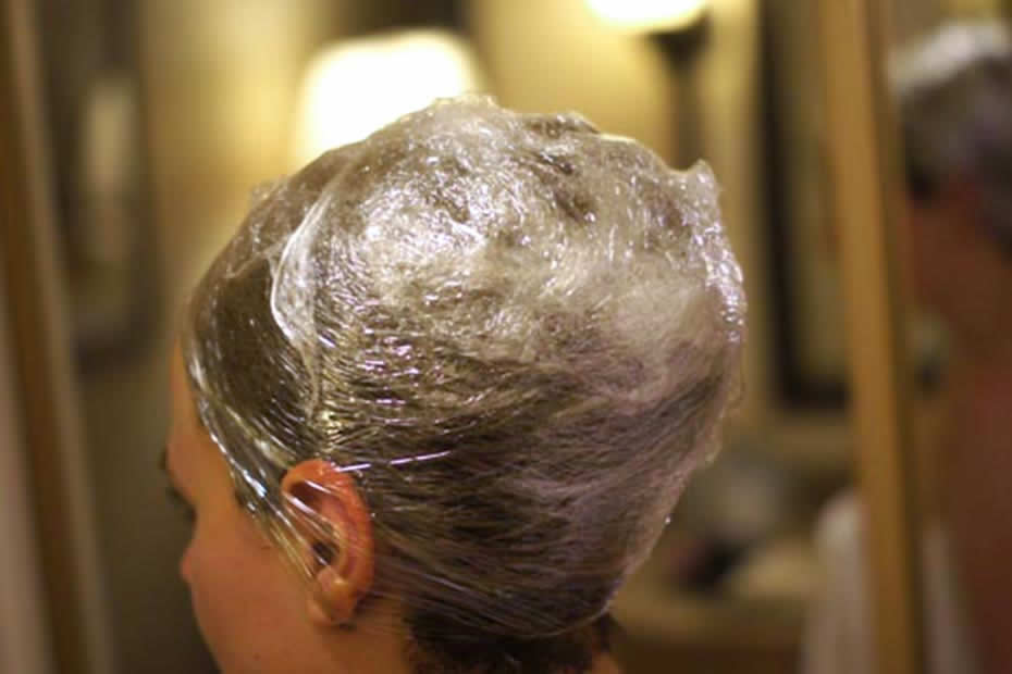  henna on hair and head wrapped with a plastic wrap