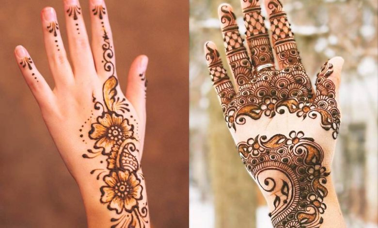 Two female hands, one with Moroccan Henna and the other one with Mehndi.