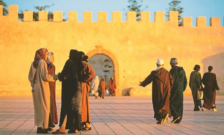 Men and women wearing Moroccan djellabas in Morocco