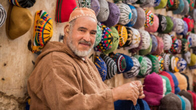 A moroccan man looking at the camera and asking himself what is morocco known for